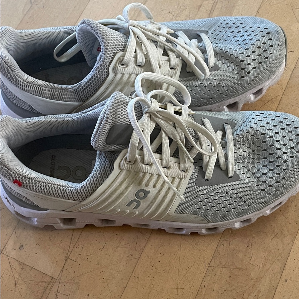 On Running Gray and White Athletic Shoes